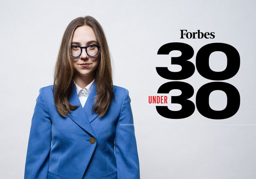 Headshot of Emma Konet with Forbes 30 under 30 written to the right.