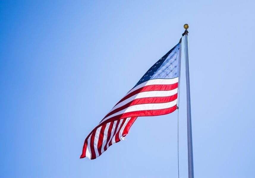 American flag flying on flag pole.